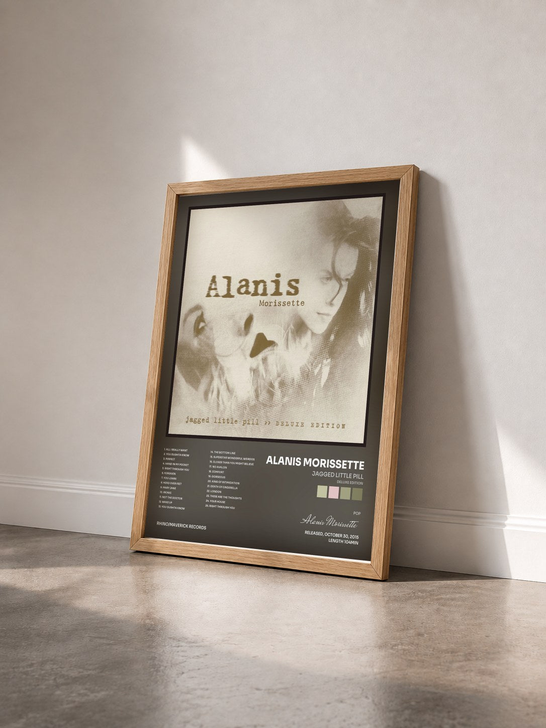 #bois Tableau de l'album Jagged Little Pill (Deluxe Edition) de Alanis Morissette vu de trois quarts, cadre en bois brut