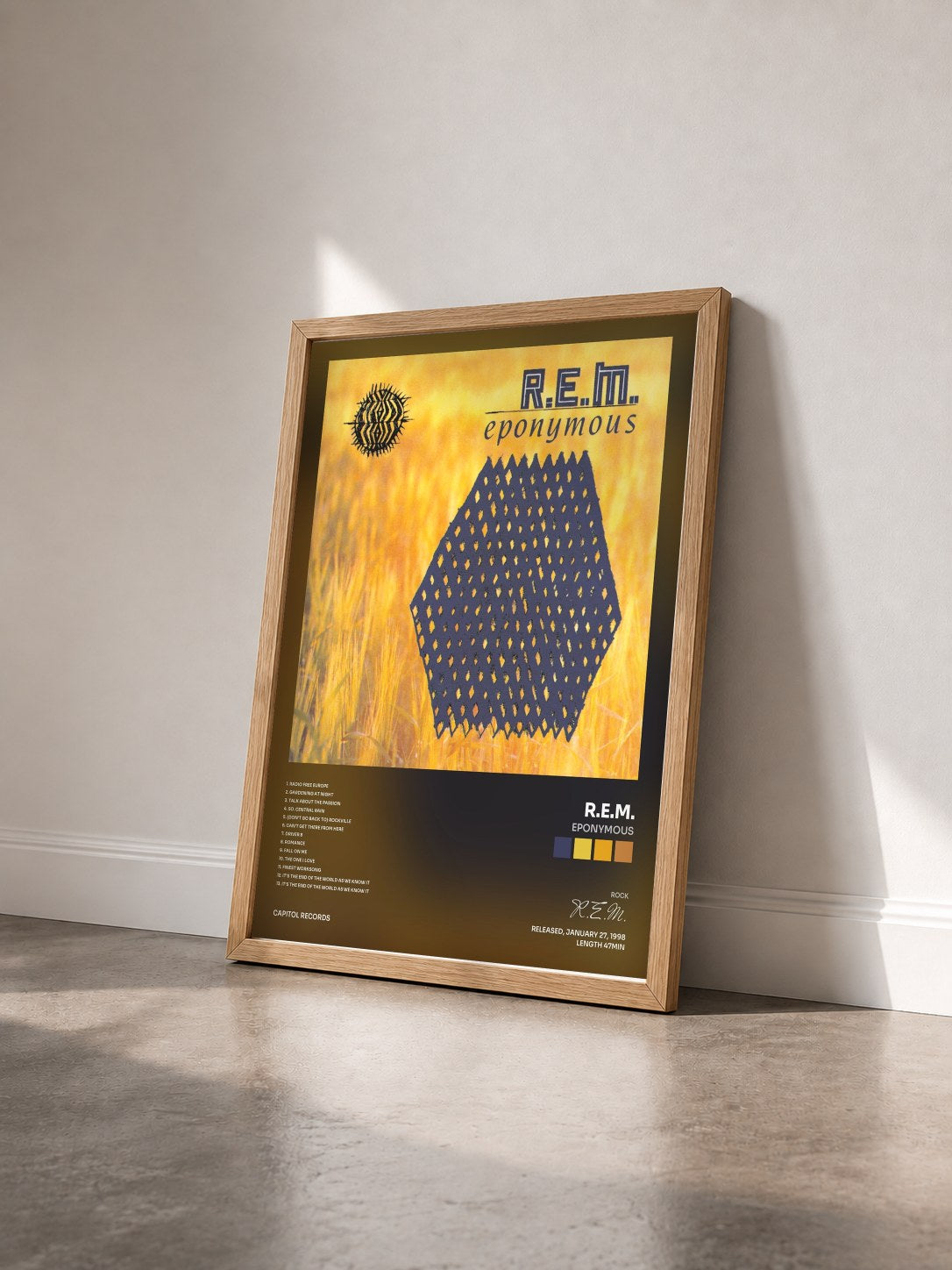 #bois Tableau de l'album Eponymous de R.E.M. vu de trois quarts, cadre en bois brut