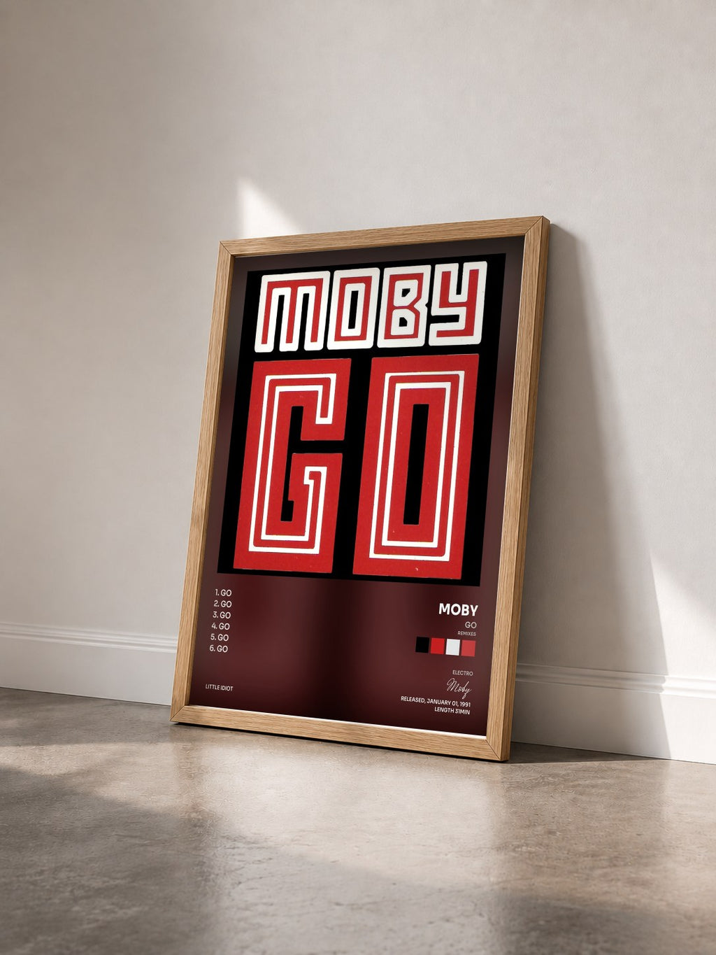 #bois Tableau de l'album Go (Remixes) de Moby vu de trois quarts, cadre en bois brut