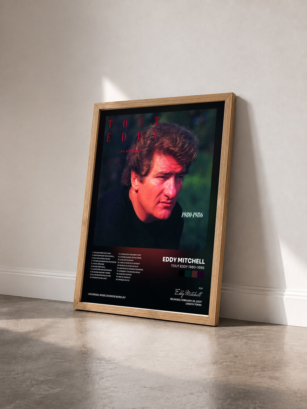 #bois Tableau de l'album Tout Eddy 1980-1986 de Eddy Mitchell vu de trois quarts, cadre en bois brut