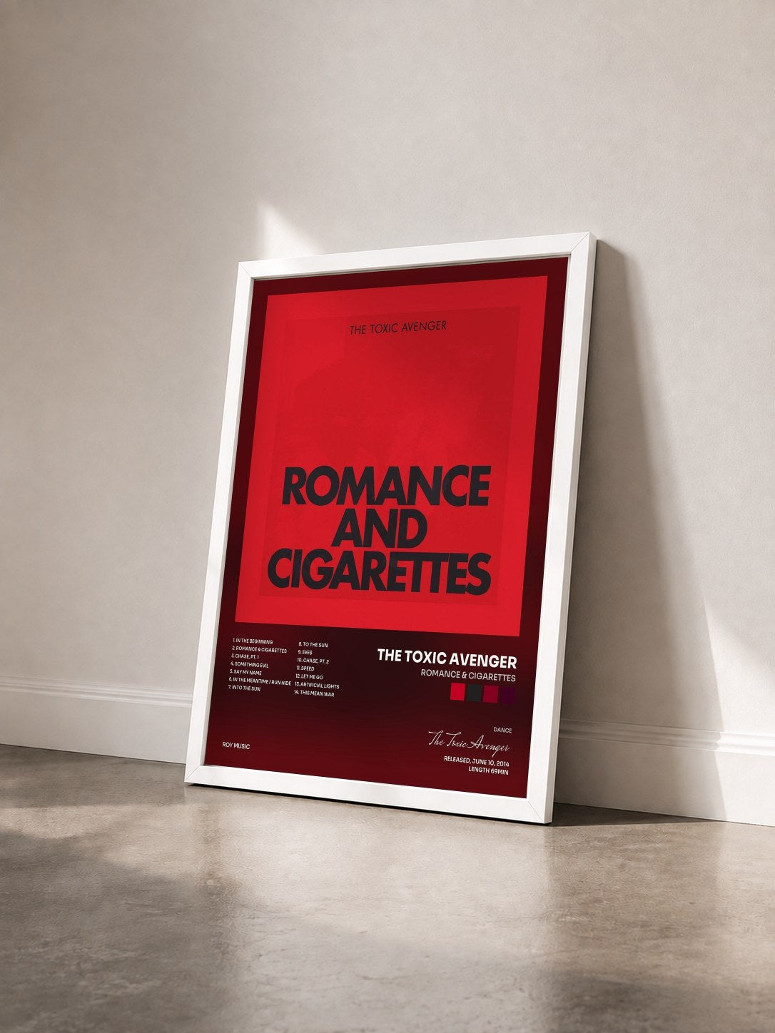 #blanc Tableau de l'album Romance & Cigarettes de The Toxic Avenger vu de trois quarts, cadre blanc