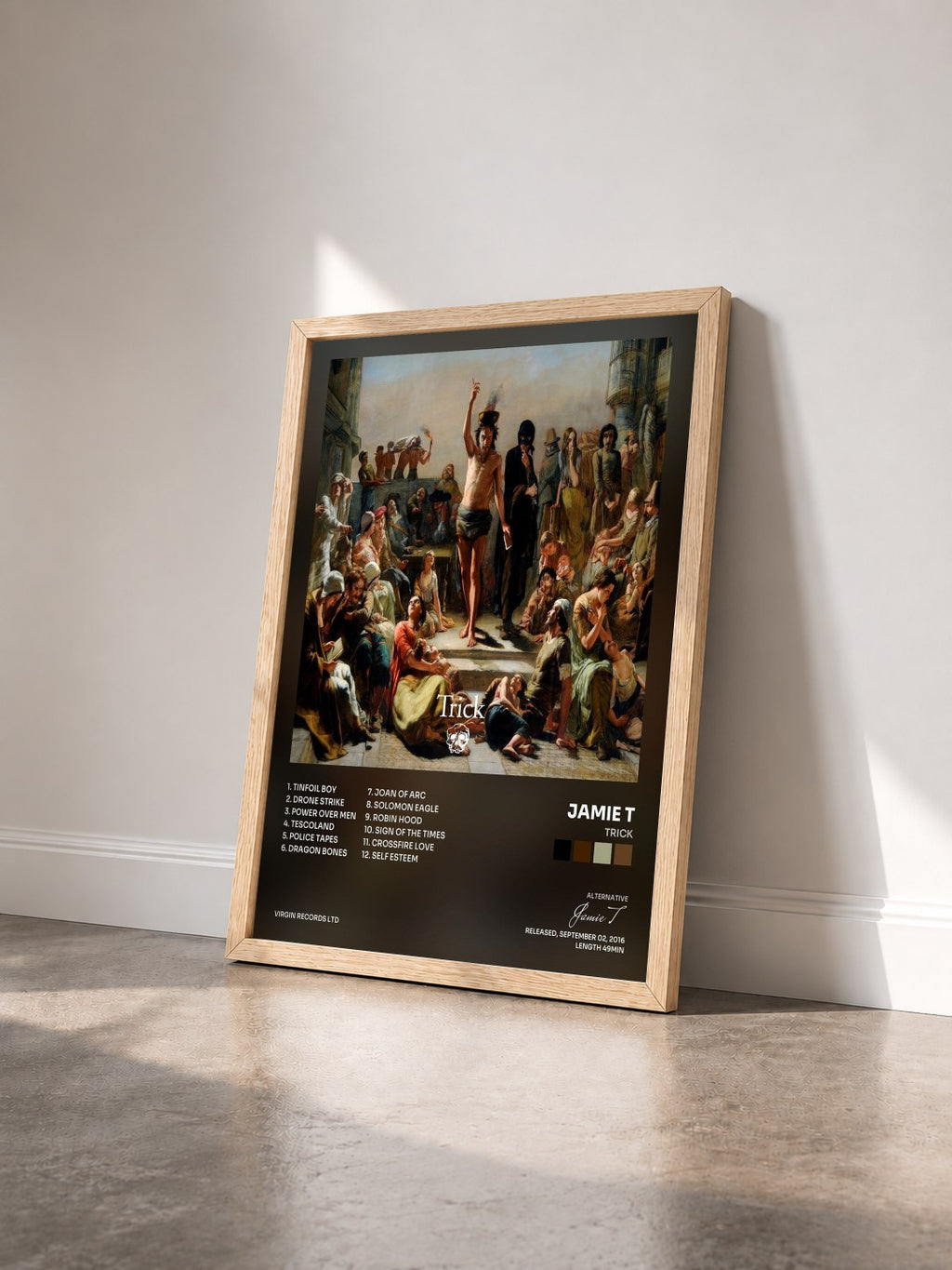 #bois Tableau de l'album Trick de Jamie T vu de trois quarts, cadre en bois brut