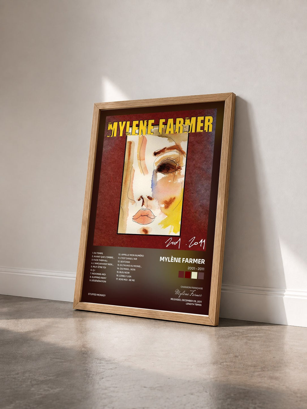 #bois Tableau de l'album 2001 - 2011 de Mylène Farmer vu de trois quarts, cadre en bois brut