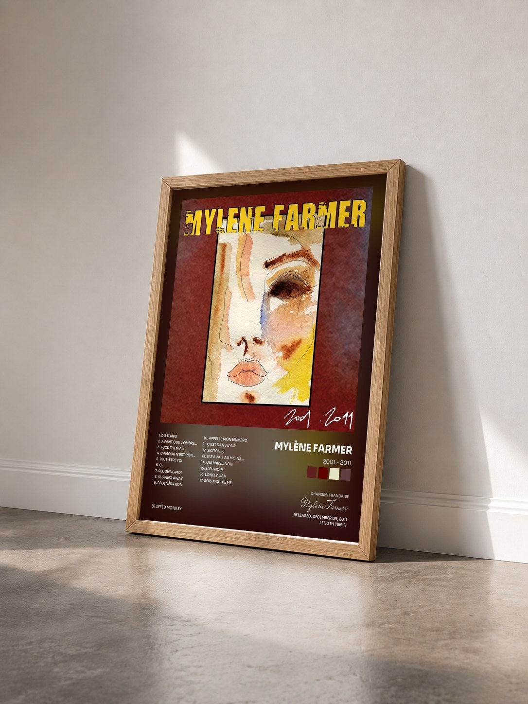 #bois Tableau de l'album 2001 - 2011 de Mylène Farmer vu de trois quarts, cadre en bois brut