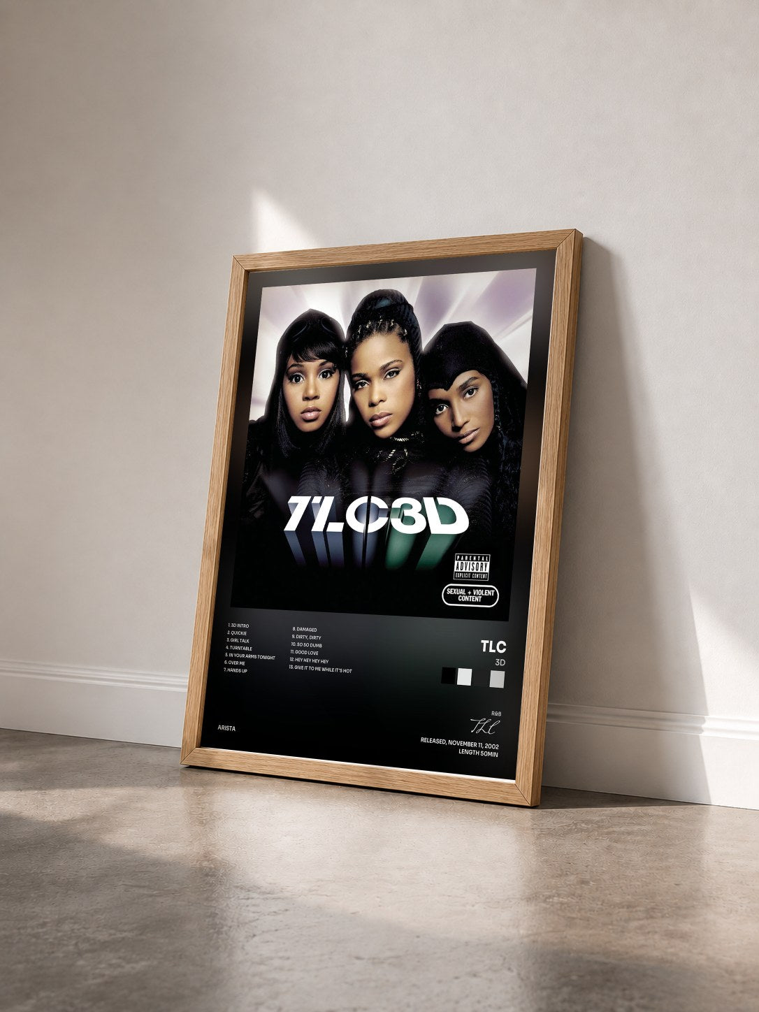 #bois Tableau de l'album 3D de TLC vu de trois quarts, cadre en bois brut