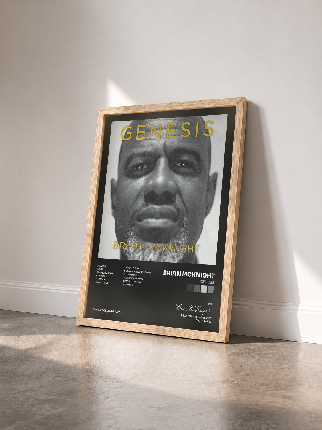 #bois Tableau de l'album Genesis de Brian McKnight vu de trois quarts, cadre en bois brut
