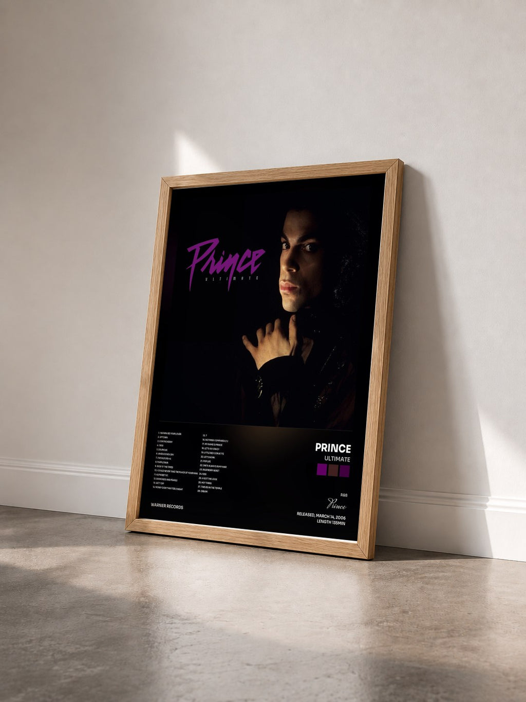 #bois Tableau de l'album Ultimate de Prince vu de trois quarts, cadre en bois brut