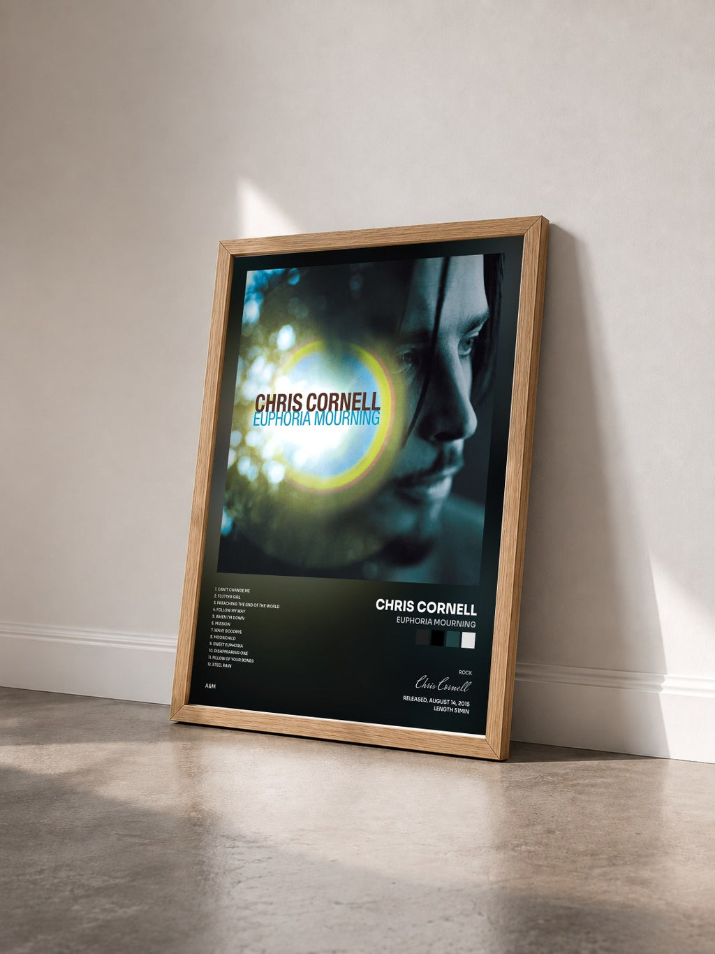 #bois Tableau de l'album Euphoria Mourning de Chris Cornell vu de trois quarts, cadre en bois brut