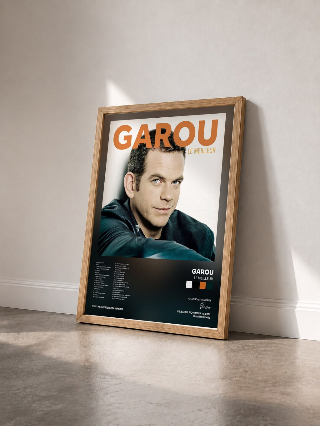 #bois Tableau de l'album Le Meilleur de Garou vu de trois quarts, cadre en bois brut