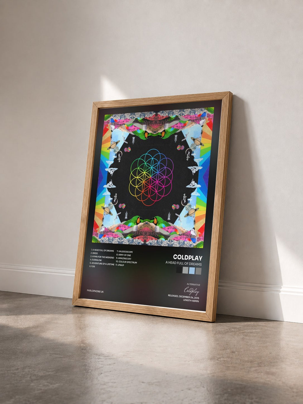 #bois Tableau de l'album A Head Full of Dreams de Coldplay vu de trois quarts, cadre en bois brut