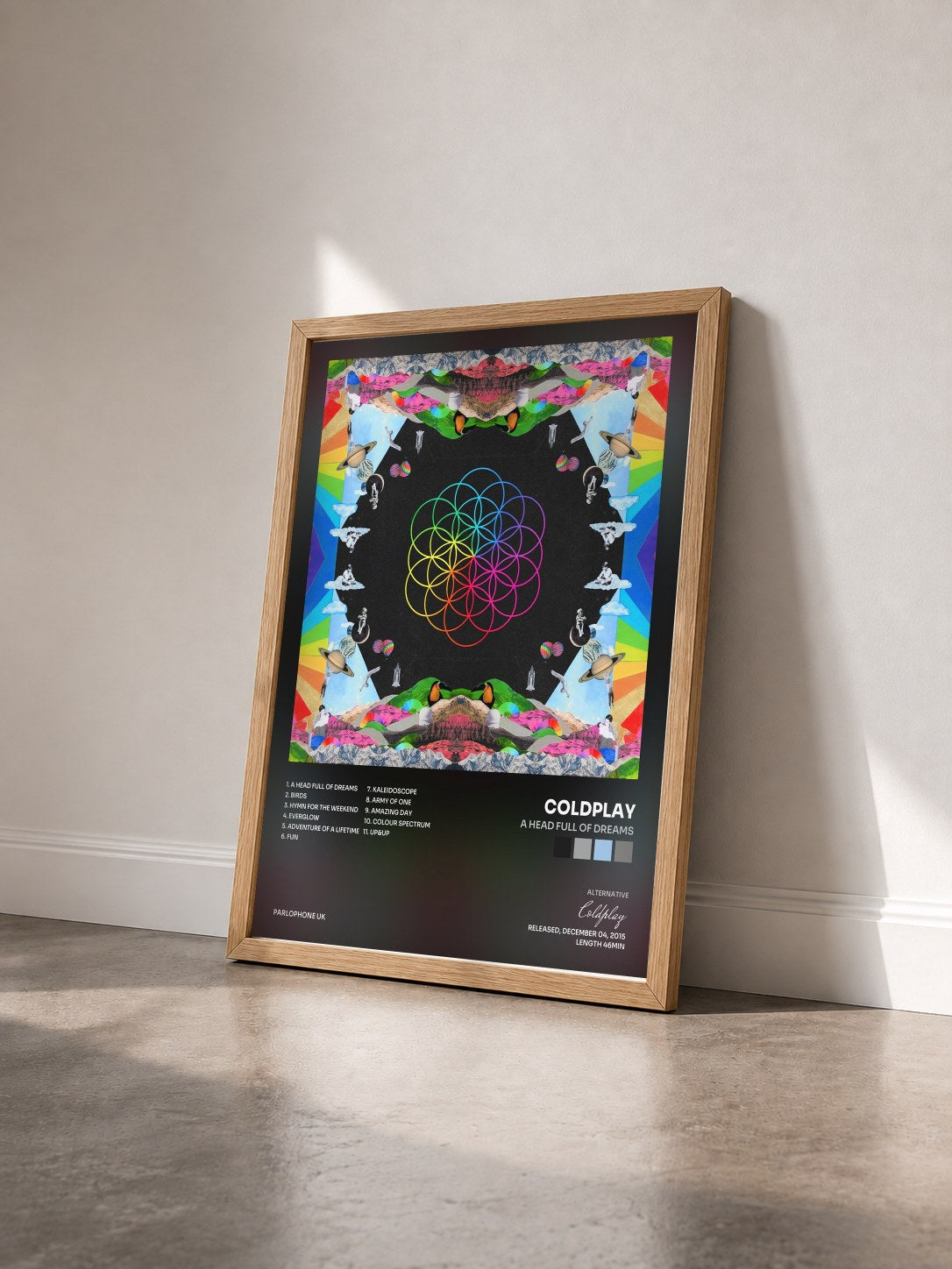 #bois Tableau de l'album A Head Full of Dreams de Coldplay vu de trois quarts, cadre en bois brut