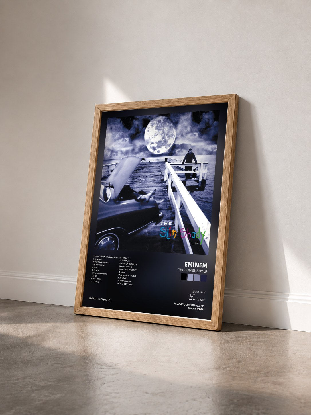#bois Tableau de l'album The Slim Shady LP de Eminem vu de trois quarts, cadre en bois brut