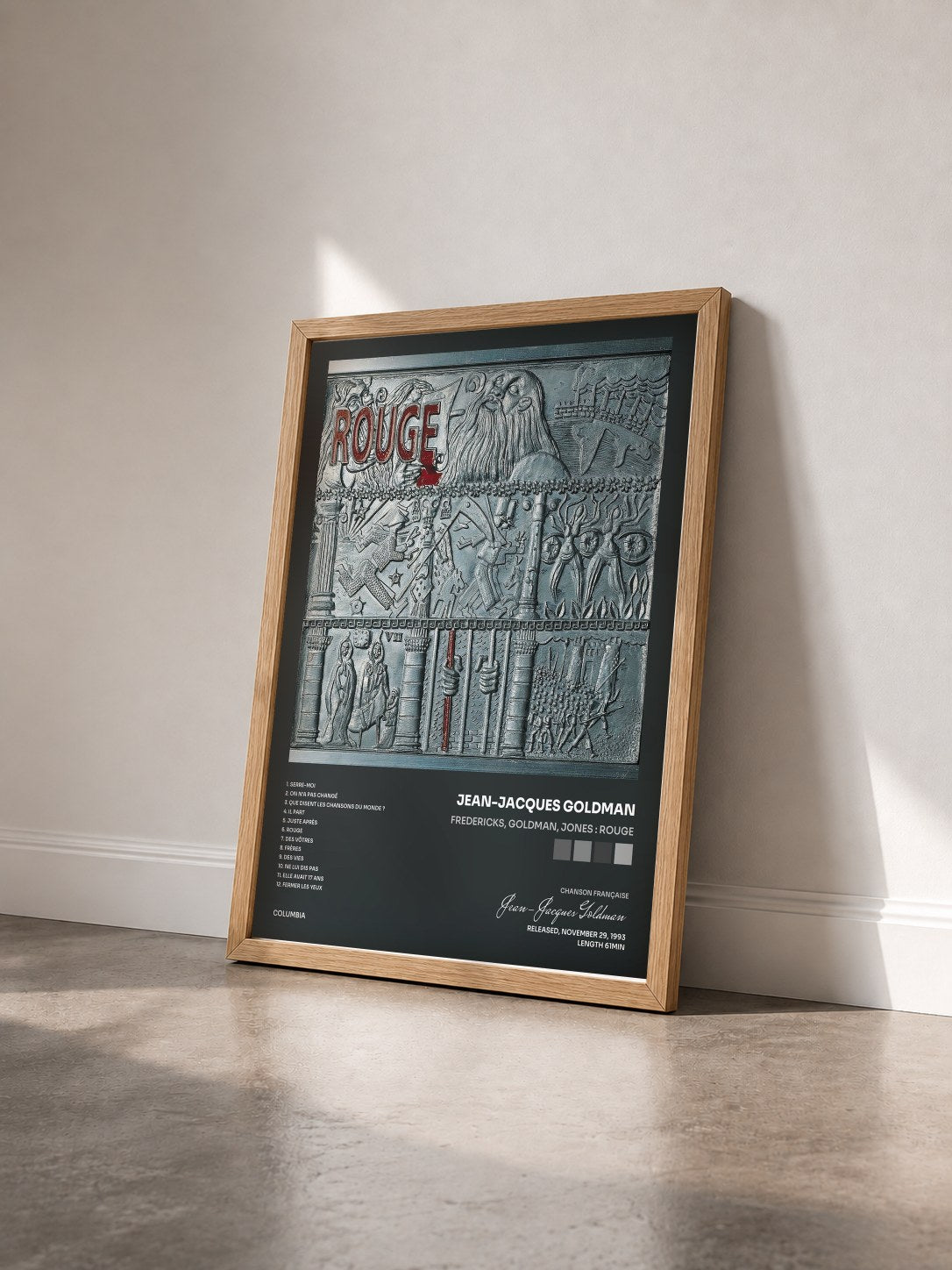 #bois Tableau de l'album Fredericks, Goldman, Jones : Rouge de Jean-Jacques Goldman vu de trois quarts, cadre en bois brut