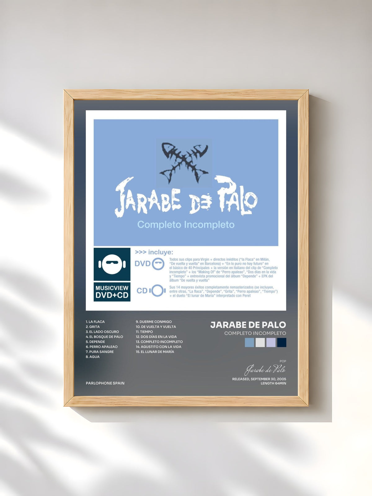 #bois Tableau de l'album Completo Incompleto de Jarabe de Palo, cadre en bois brut, imprimé et encadré en France