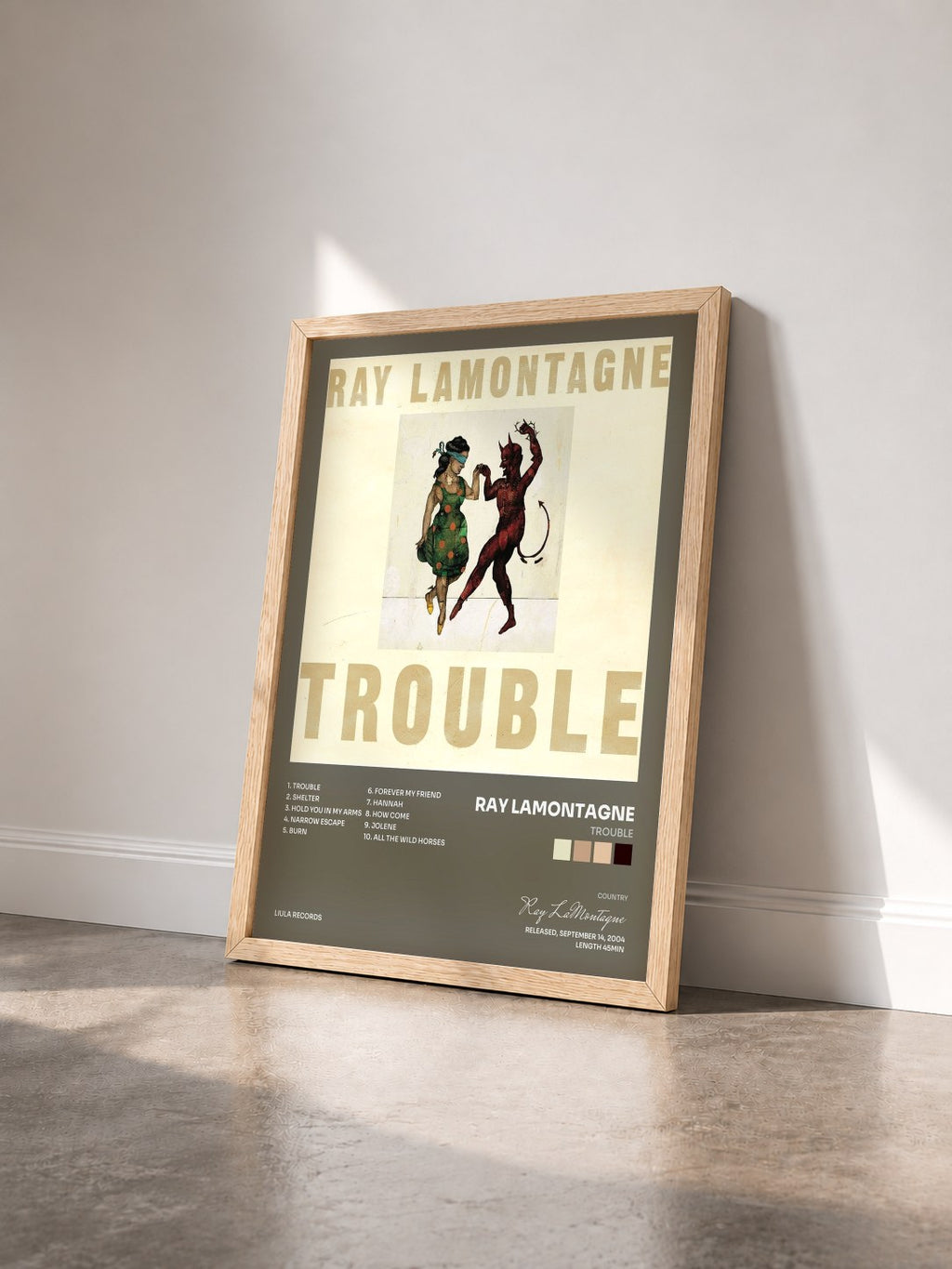 #bois Tableau de l'album Trouble de Ray LaMontagne vu de trois quarts, cadre en bois brut