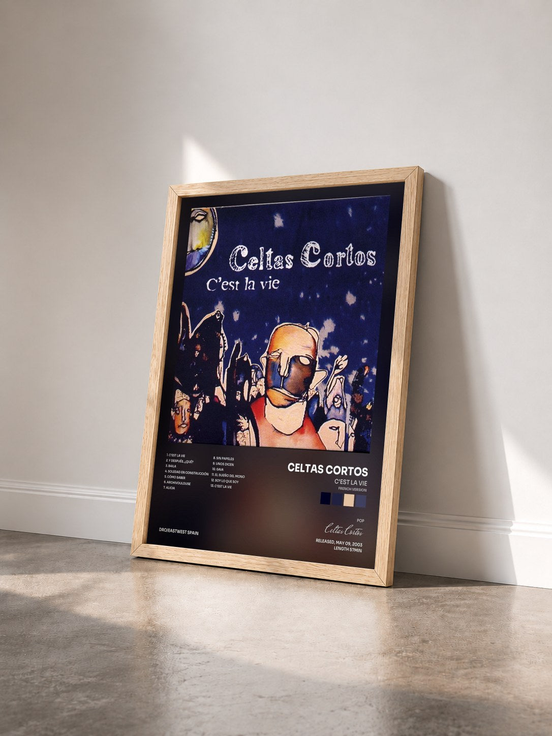 #bois Tableau de l'album C'est la vie (French version) de Celtas Cortos vu de trois quarts, cadre en bois brut