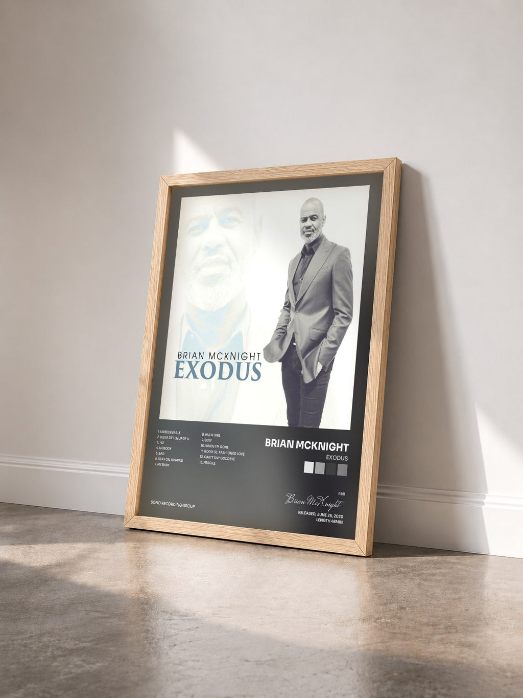 #bois Tableau de l'album Exodus de Brian McKnight vu de trois quarts, cadre en bois brut