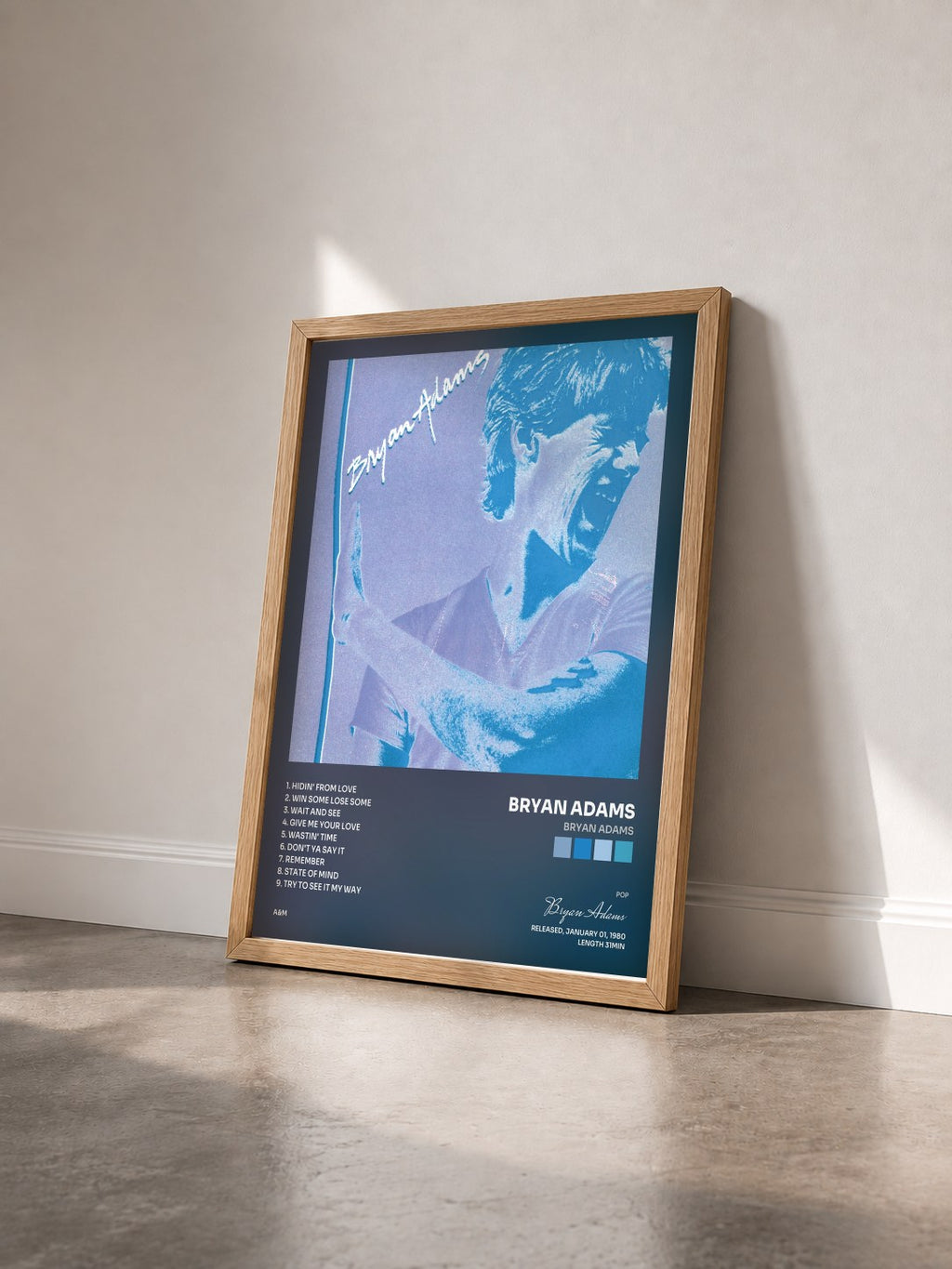 #bois Tableau de l'album Bryan Adams de Bryan Adams vu de trois quarts, cadre en bois brut