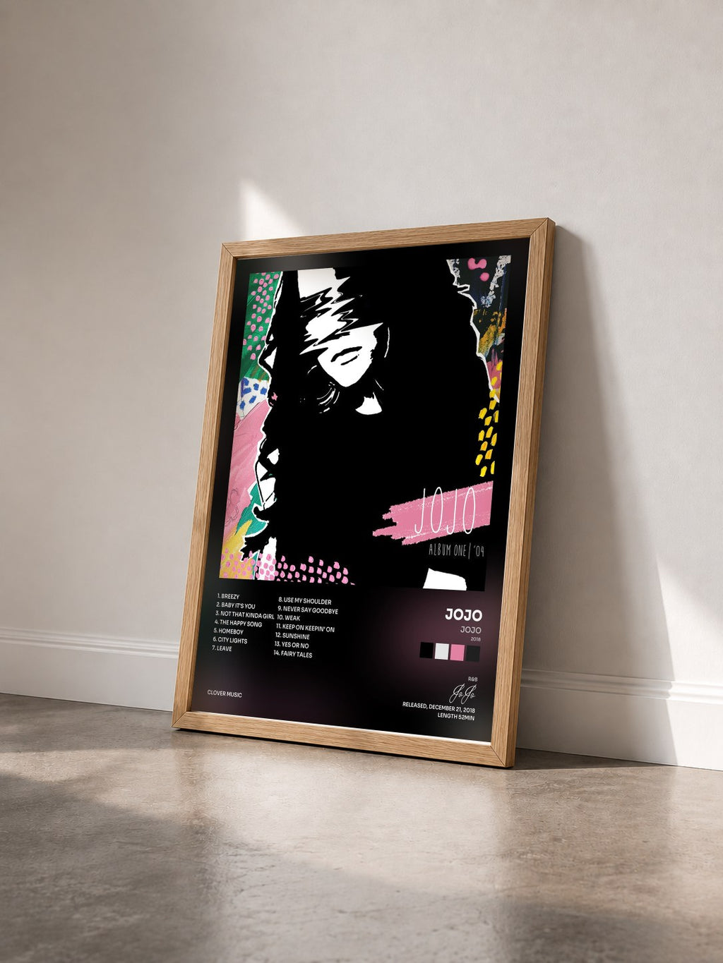 #bois Tableau de l'album JoJo (2018) de JoJo vu de trois quarts, cadre en bois brut