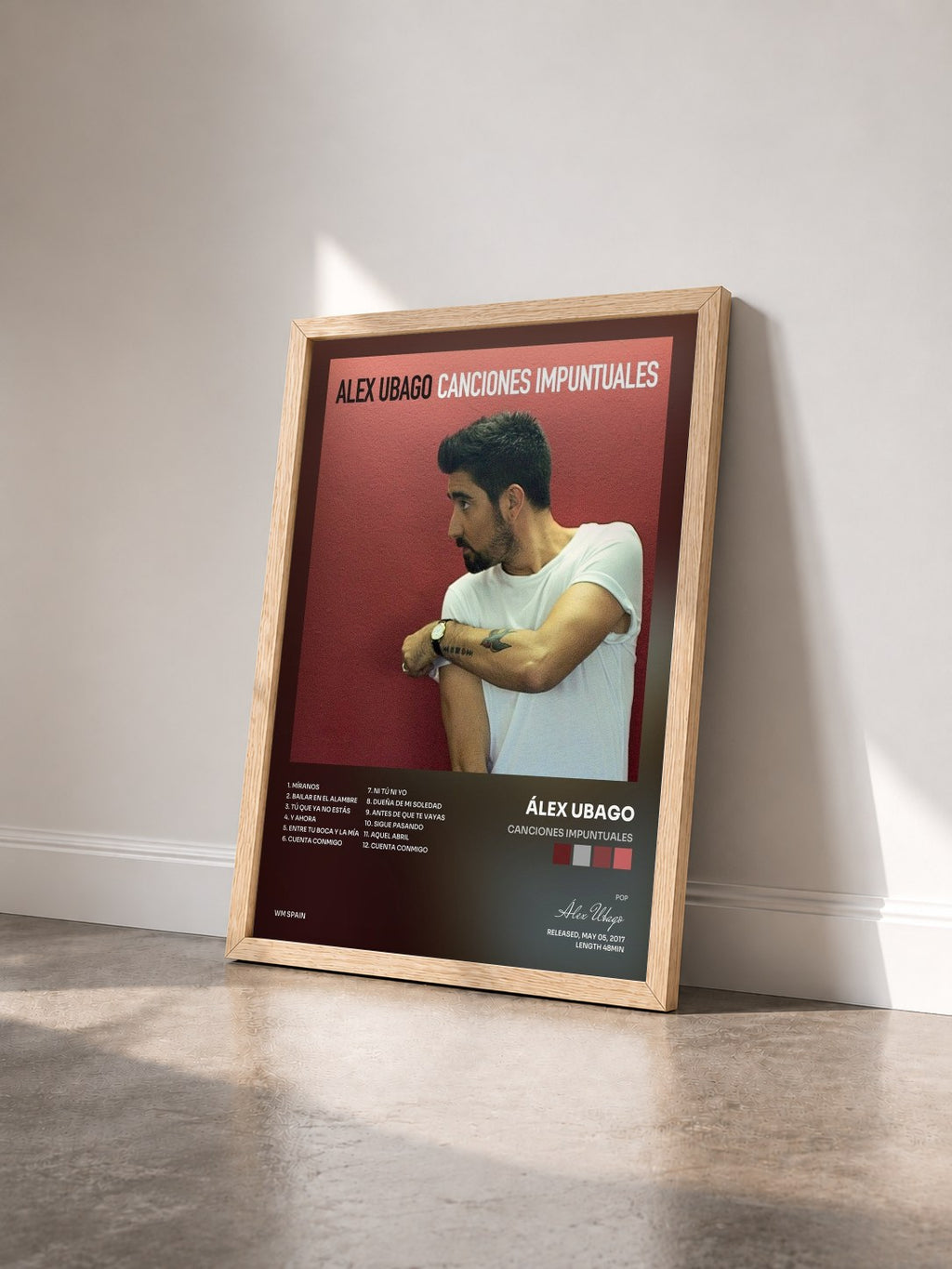 #bois Tableau de l'album Canciones impuntuales de Álex Ubago vu de trois quarts, cadre en bois brut