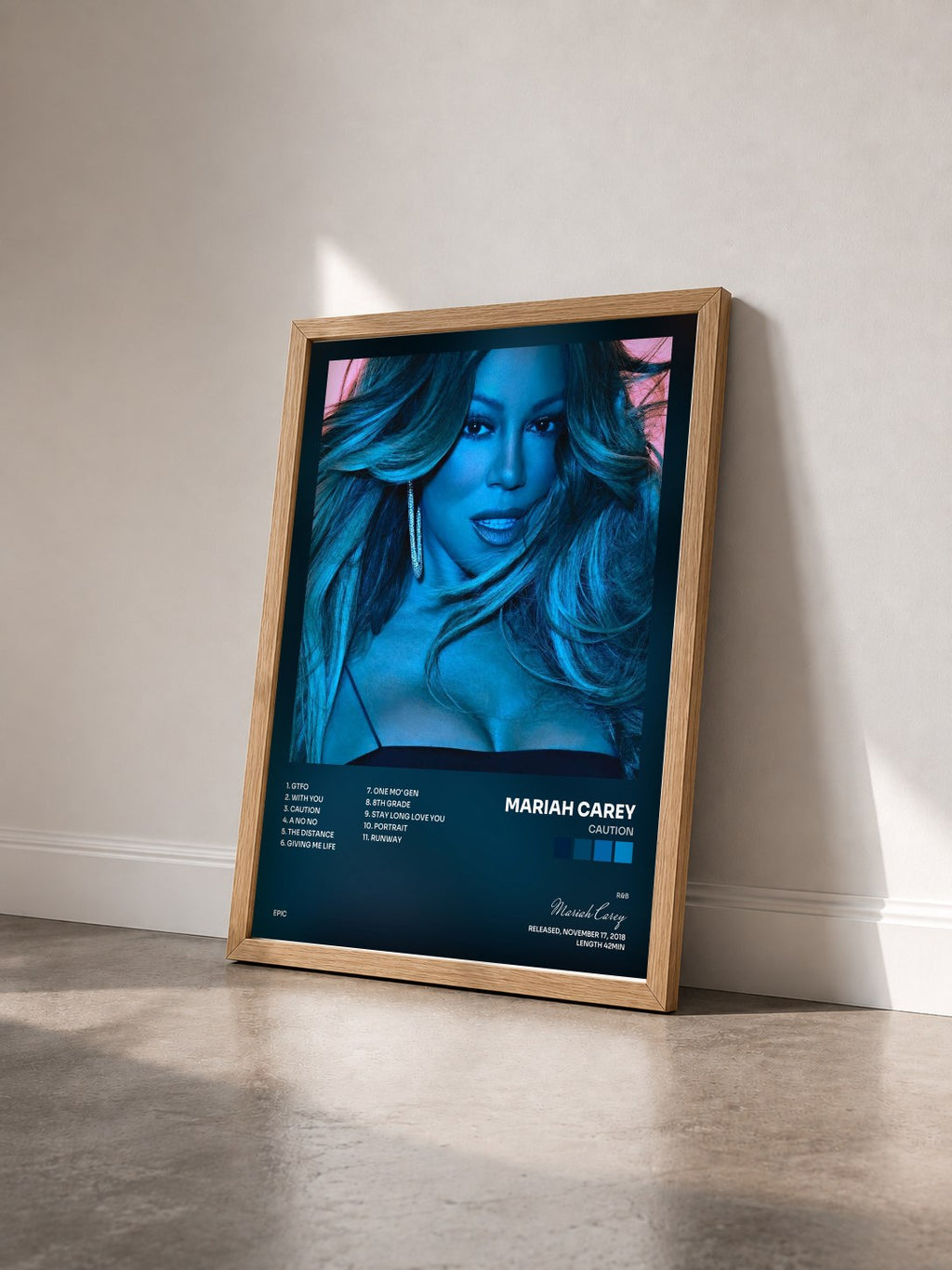 #bois Tableau de l'album Caution de Mariah Carey vu de trois quarts, cadre en bois brut