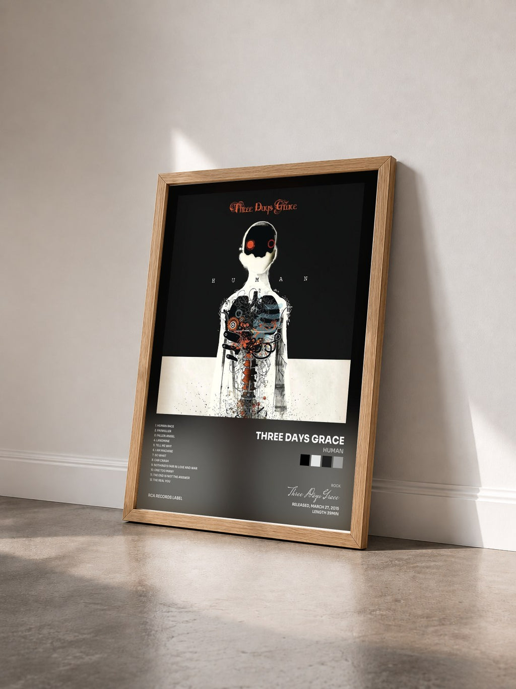 #bois Tableau de l'album Human de Three Days Grace vu de trois quarts, cadre en bois brut