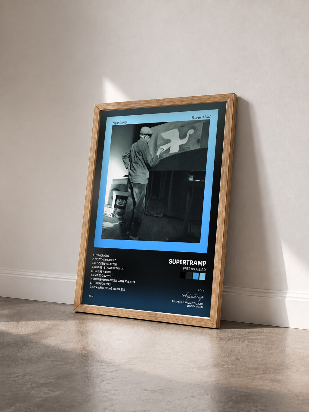 #bois Tableau de l'album Free As A Bird de Supertramp vu de trois quarts, cadre en bois brut