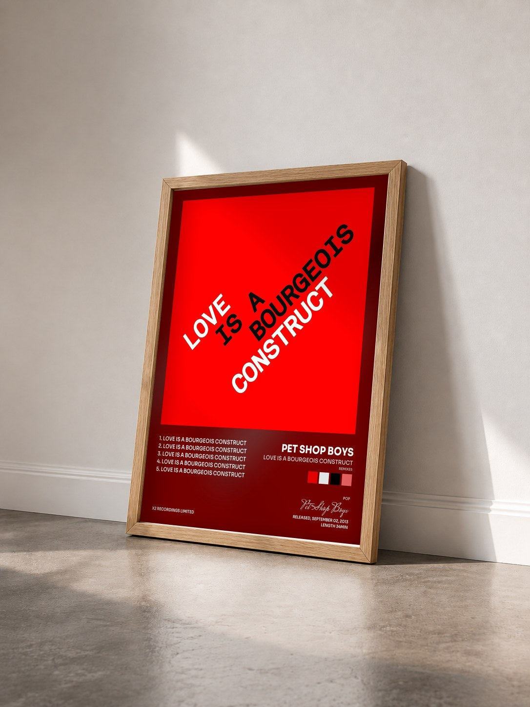 #bois Tableau de l'album Love is a Bourgeois Construct (Remixes) de Pet Shop Boys vu de trois quarts, cadre en bois brut