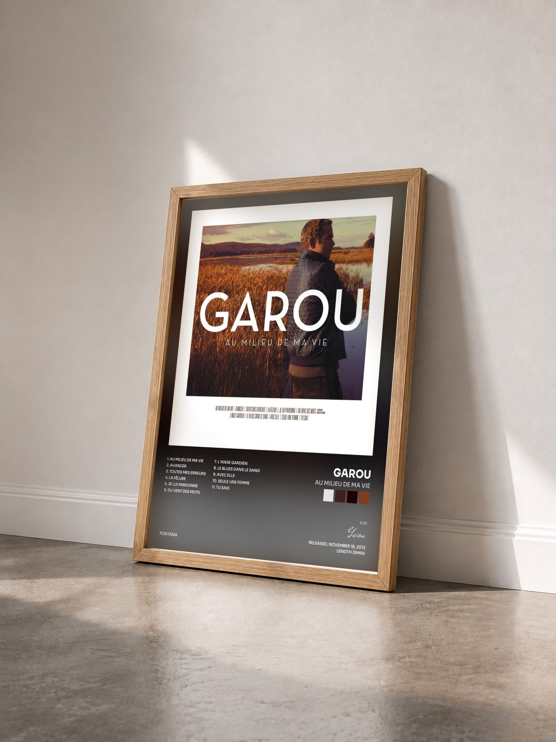 #bois Tableau de l'album Au Milieu De Ma Vie de Garou vu de trois quarts, cadre en bois brut