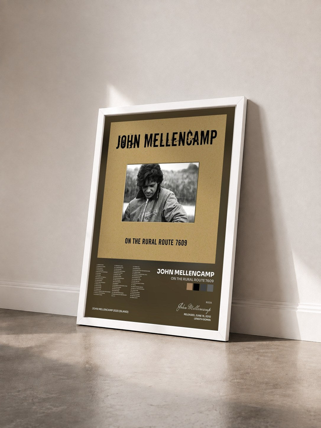 #blanc Tableau de l'album On The Rural Route 7609 de John Mellencamp vu de trois quarts, cadre blanc