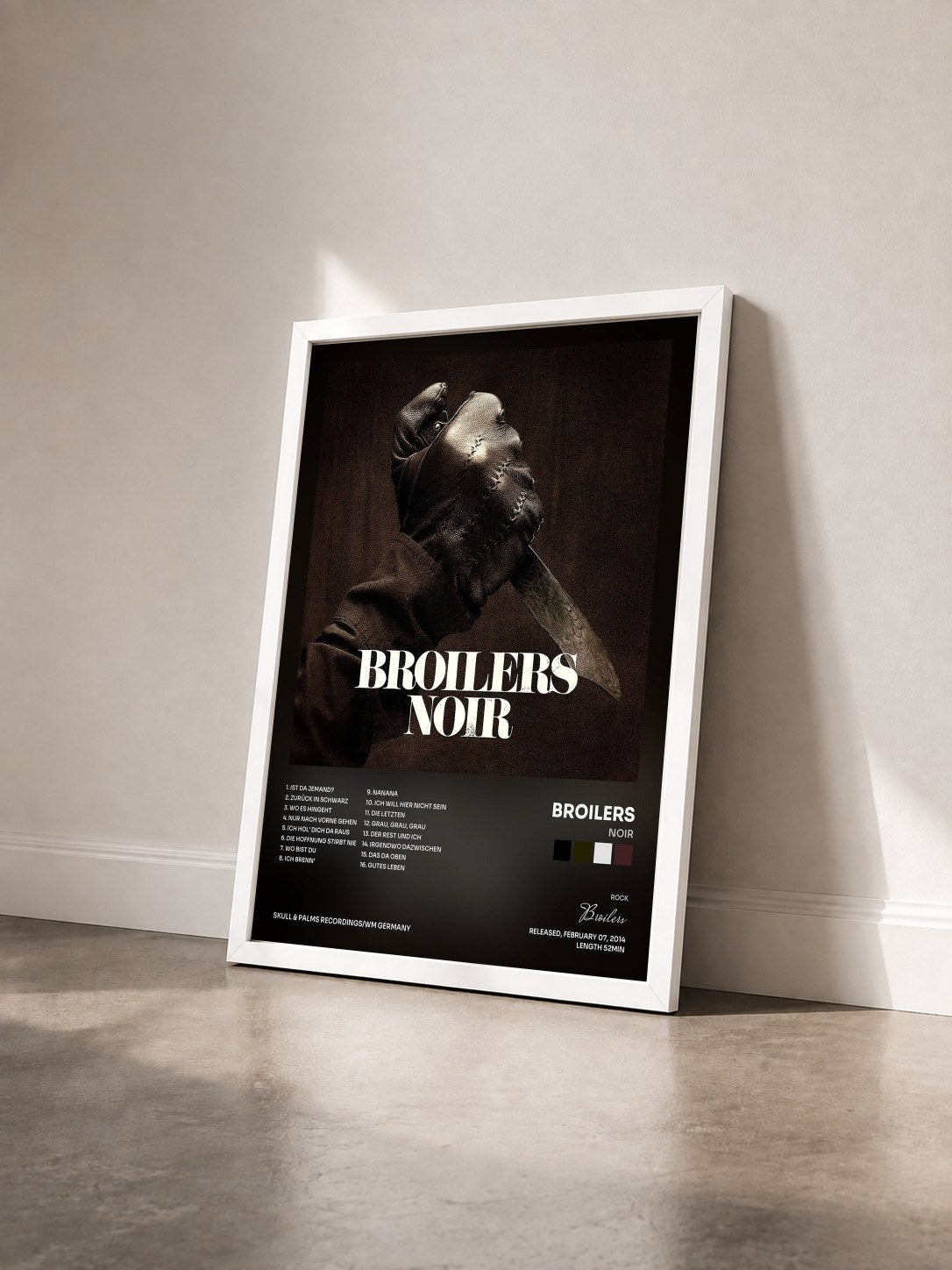 #blanc Tableau de l'album Noir de Broilers vu de trois quarts, cadre blanc