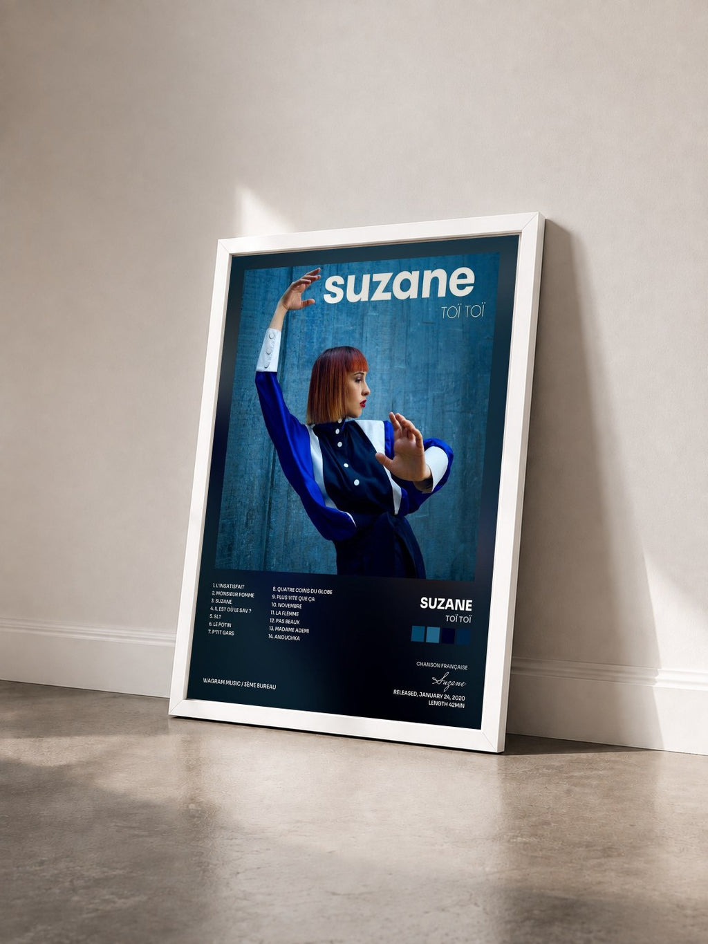 #blanc Tableau de l'album Toï Toï de Suzane vu de trois quarts, cadre blanc