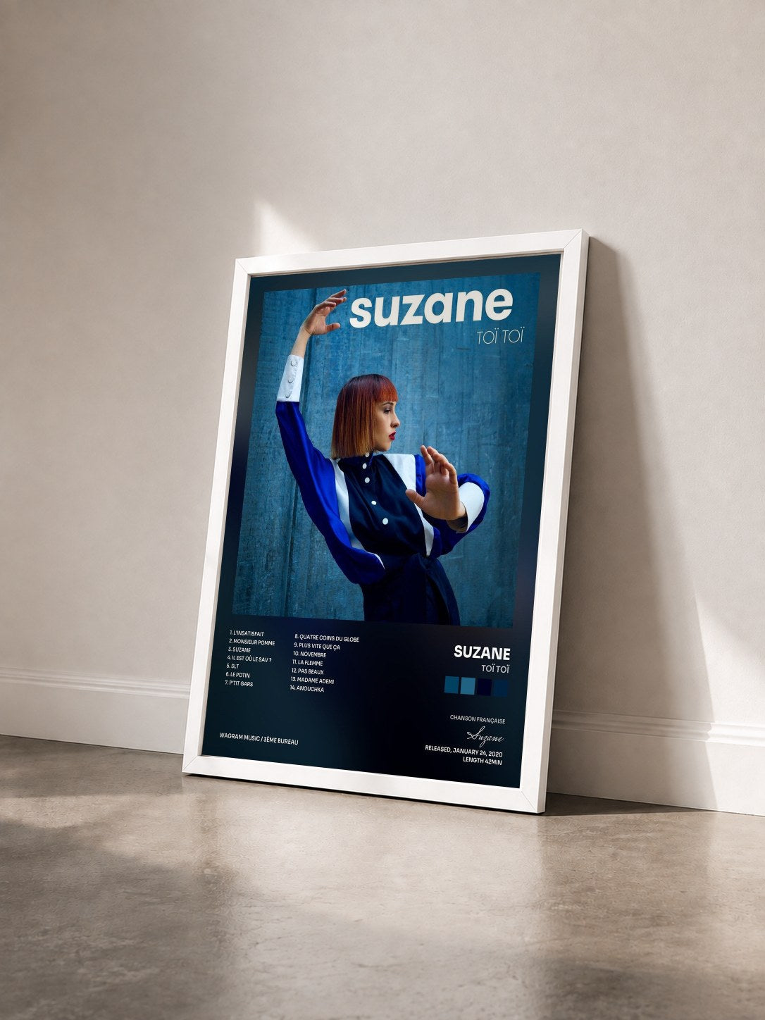 #blanc Tableau de l'album Toï Toï de Suzane vu de trois quarts, cadre blanc