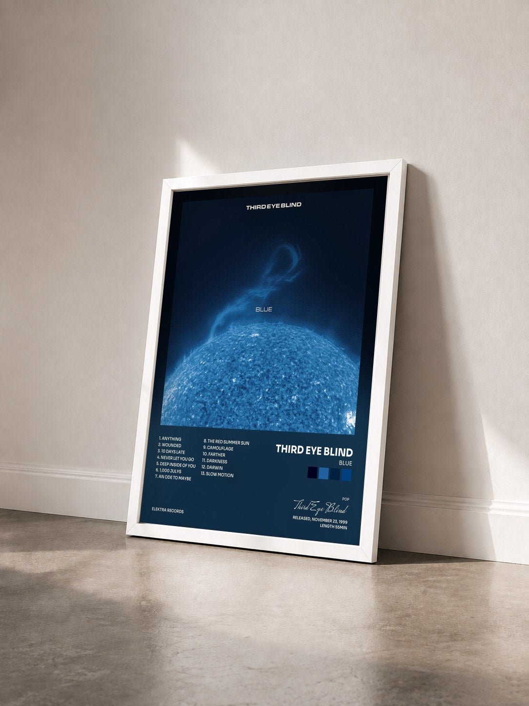 #blanc Tableau de l'album Blue de Third Eye Blind vu de trois quarts, cadre blanc