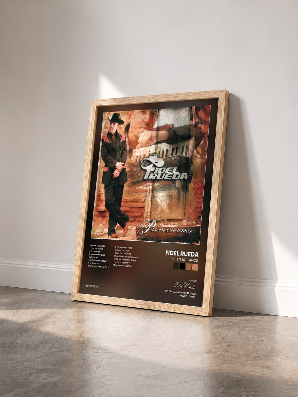 #bois Tableau de l'album Paz en Este Amor de Fidel Rueda vu de trois quarts, cadre en bois brut