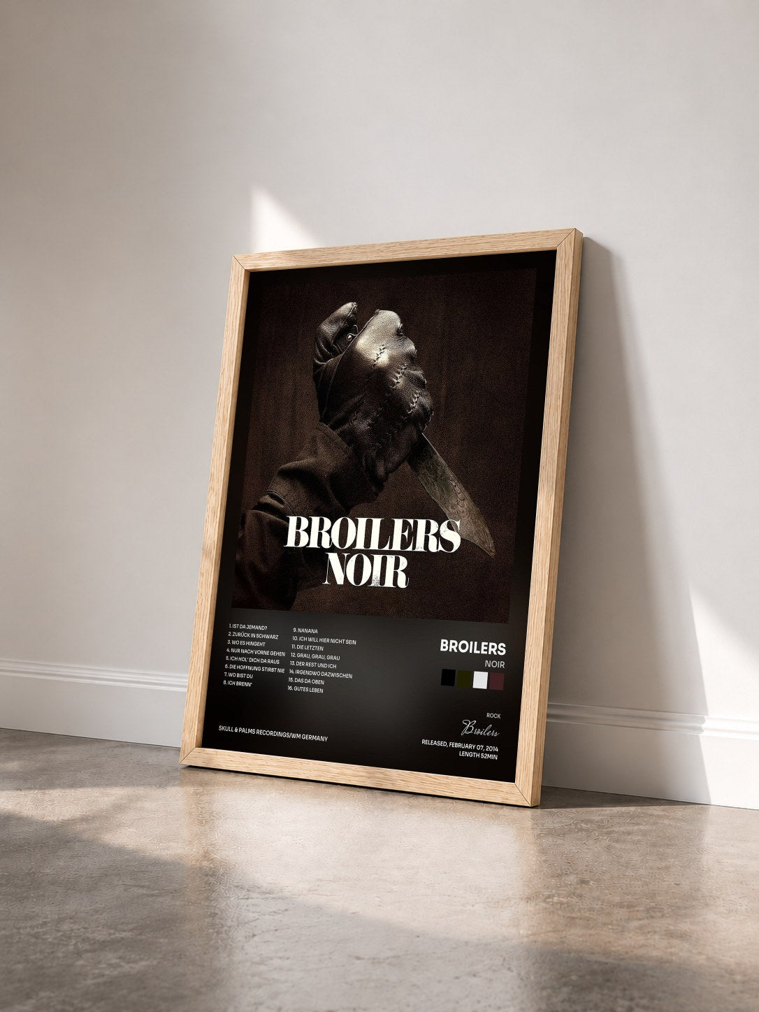 #bois Tableau de l'album Noir de Broilers vu de trois quarts, cadre en bois brut