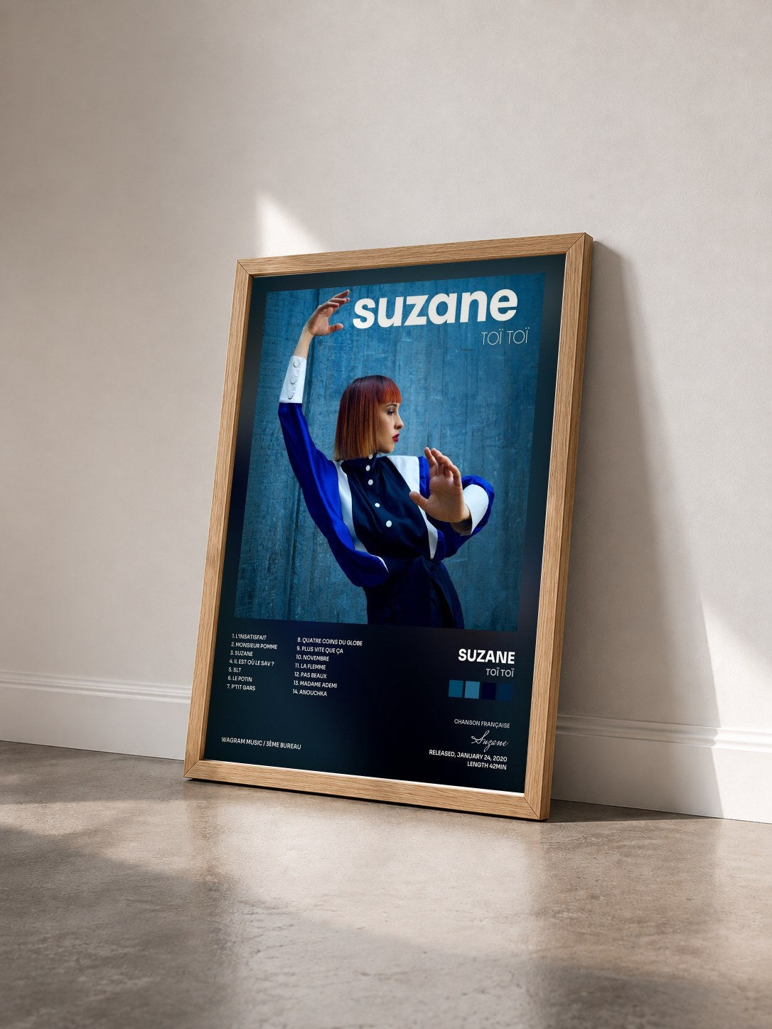 #bois Tableau de l'album Toï Toï de Suzane vu de trois quarts, cadre en bois brut