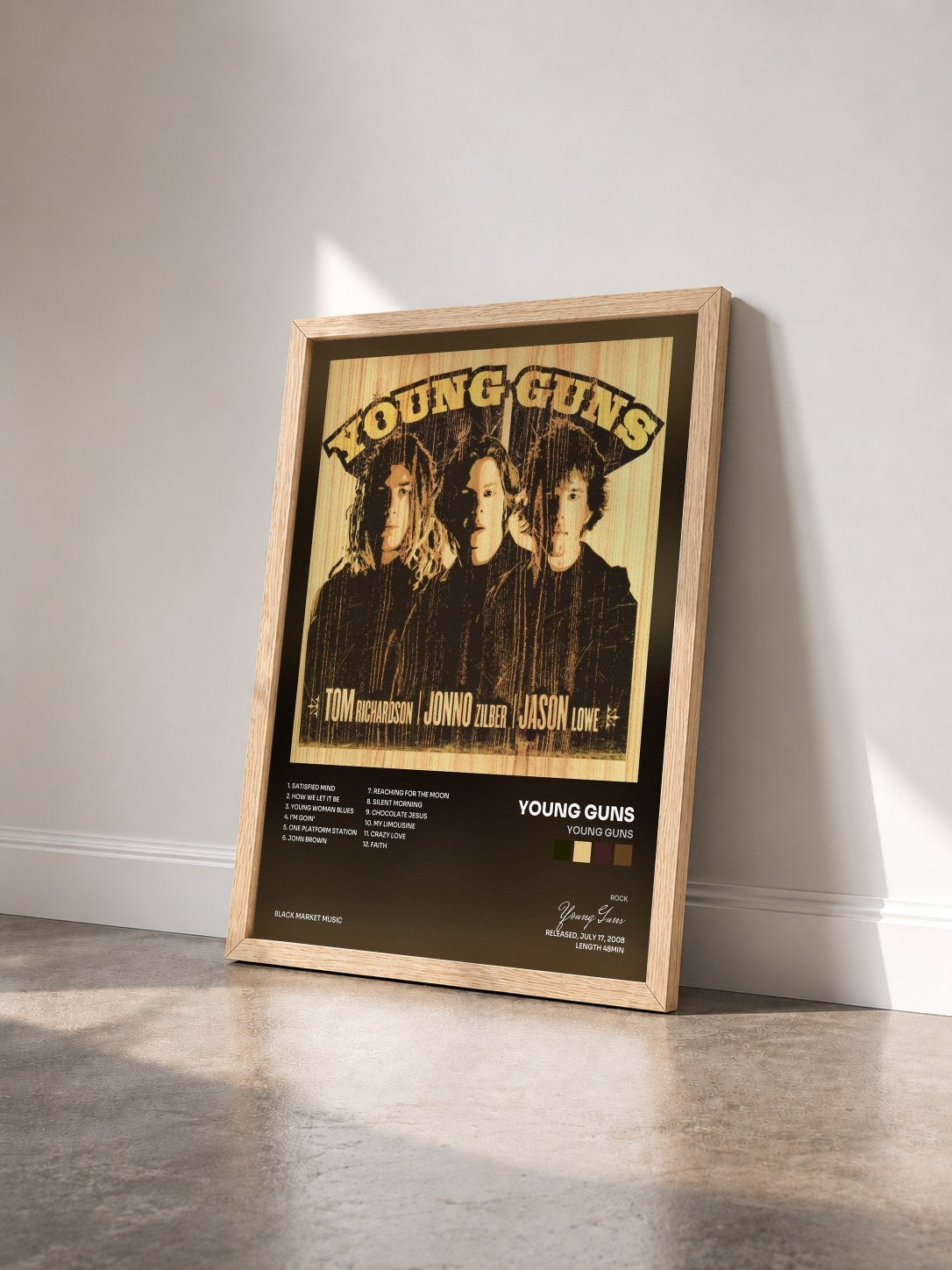 #bois Tableau de l'album Young Guns de Young Guns vu de trois quarts, cadre en bois brut