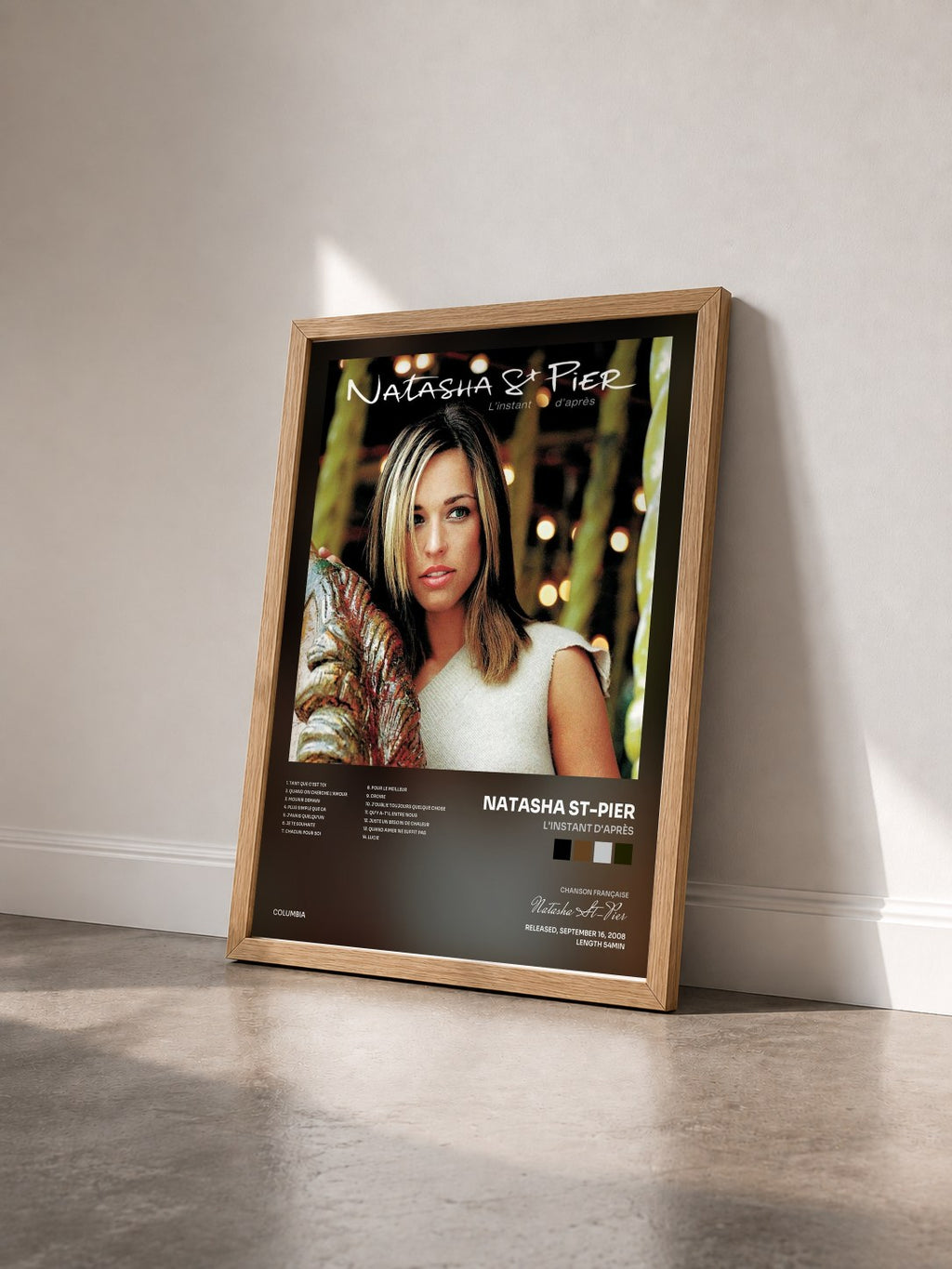 #bois Tableau de l'album L'instant d'après de Natasha St-Pier vu de trois quarts, cadre en bois brut