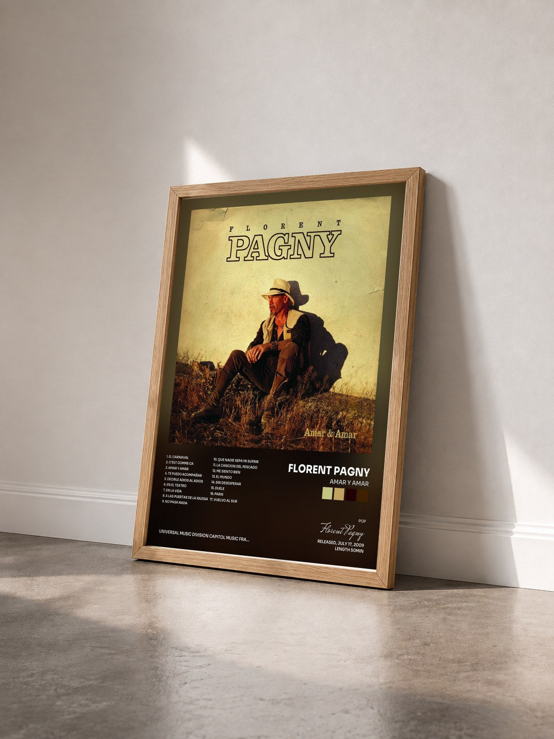 #bois Tableau de l'album Amar Y Amar de Florent Pagny vu de trois quarts, cadre en bois brut