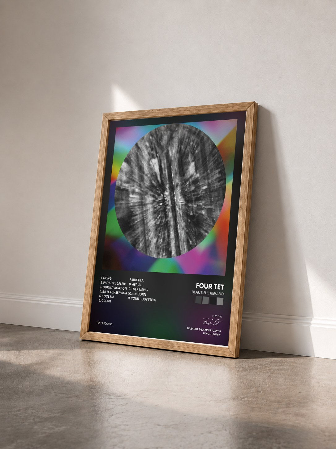 #bois Tableau de l'album Beautiful Rewind de Four Tet vu de trois quarts, cadre en bois brut