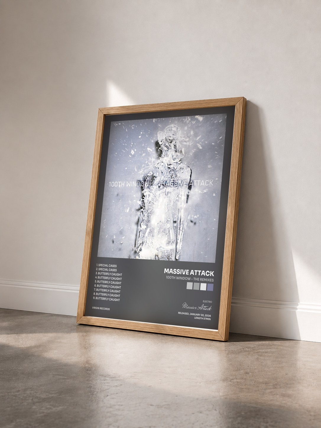 #bois Tableau de l'album 100th Window - The Remixes de Massive Attack vu de trois quarts, cadre en bois brut