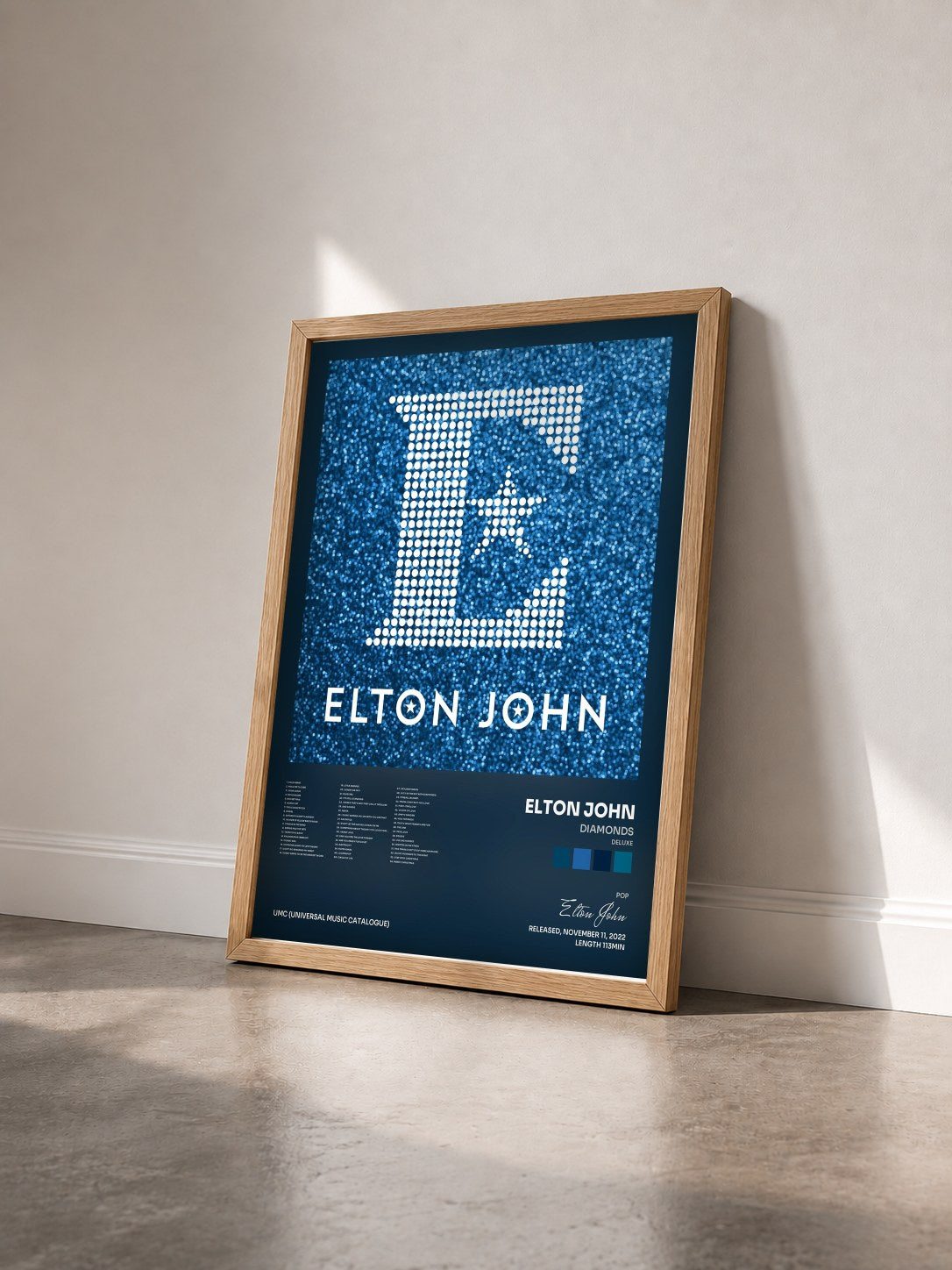 #bois Tableau de l'album Diamonds (Deluxe) de Elton John vu de trois quarts, cadre en bois brut