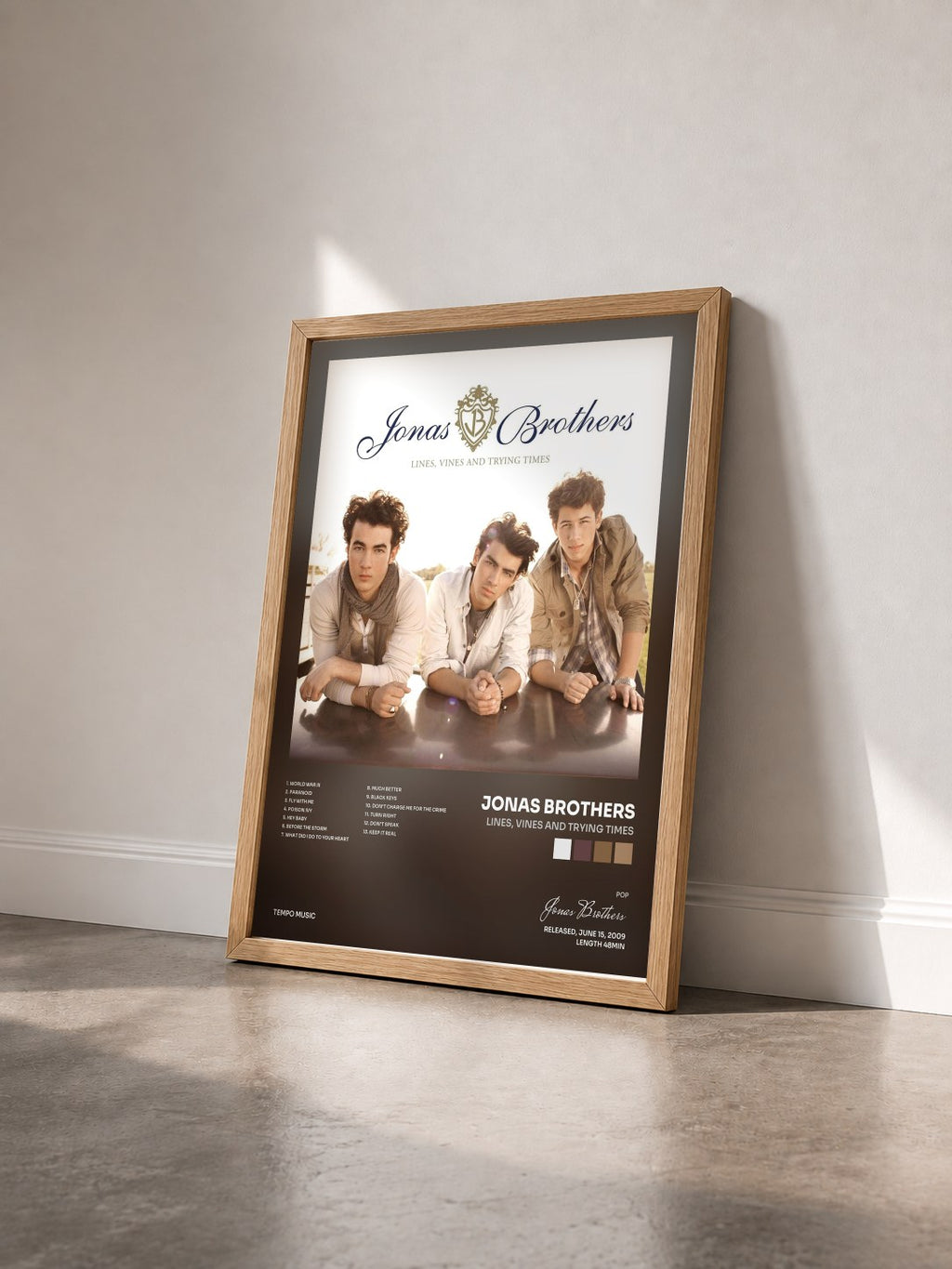 #bois Tableau de l'album Lines, Vines and Trying Times de Jonas Brothers vu de trois quarts, cadre en bois brut