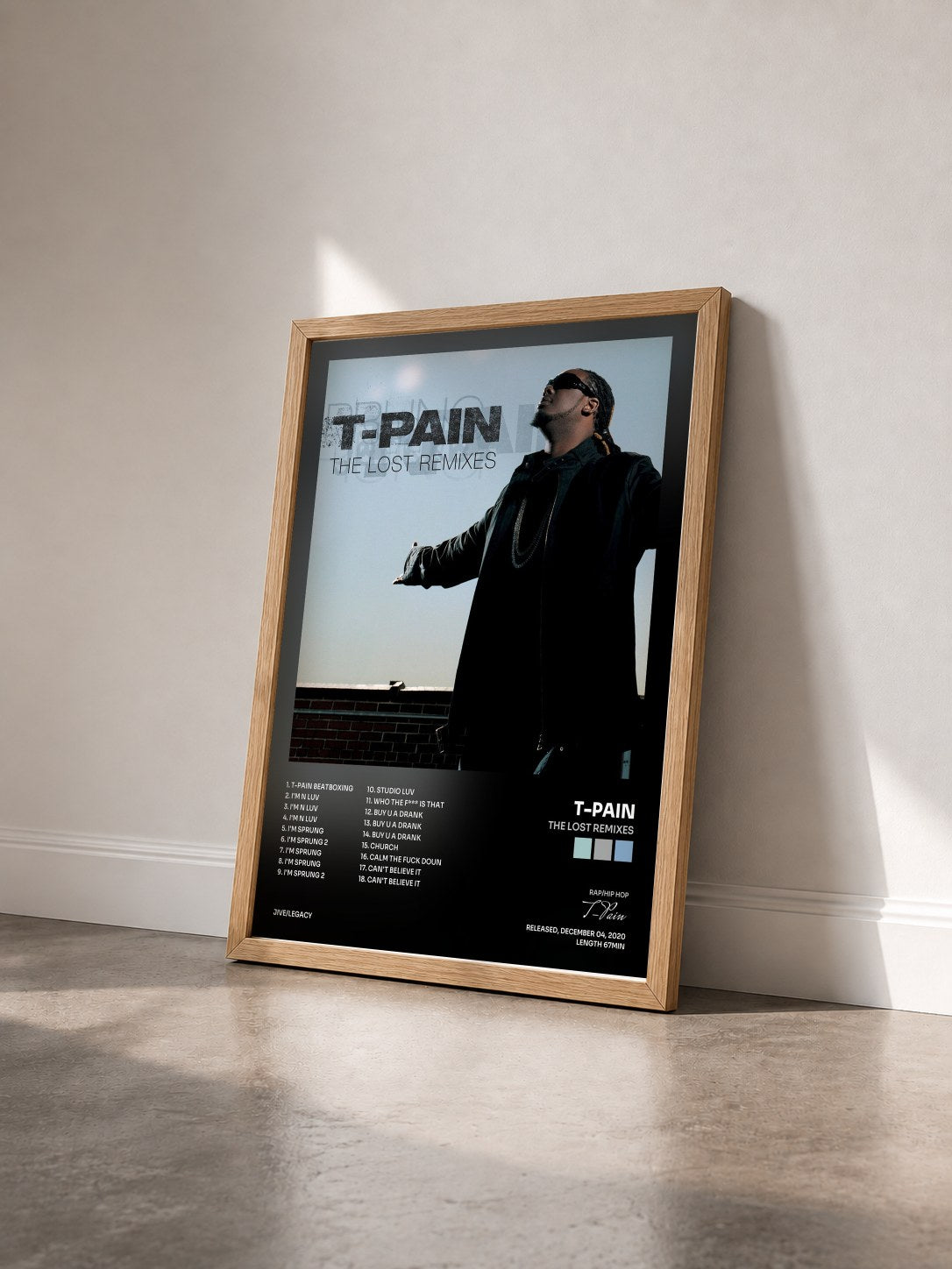 #bois Tableau de l'album The Lost Remixes de T-Pain vu de trois quarts, cadre en bois brut