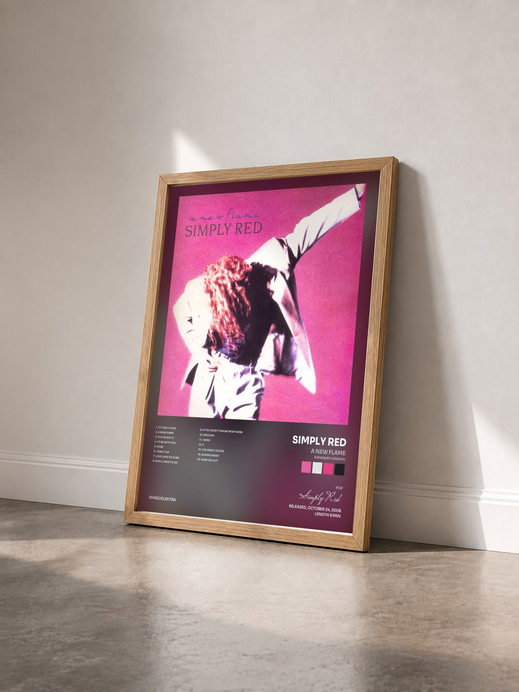 #bois Tableau de l'album A New Flame (Expanded Version) de Simply Red vu de trois quarts, cadre en bois brut