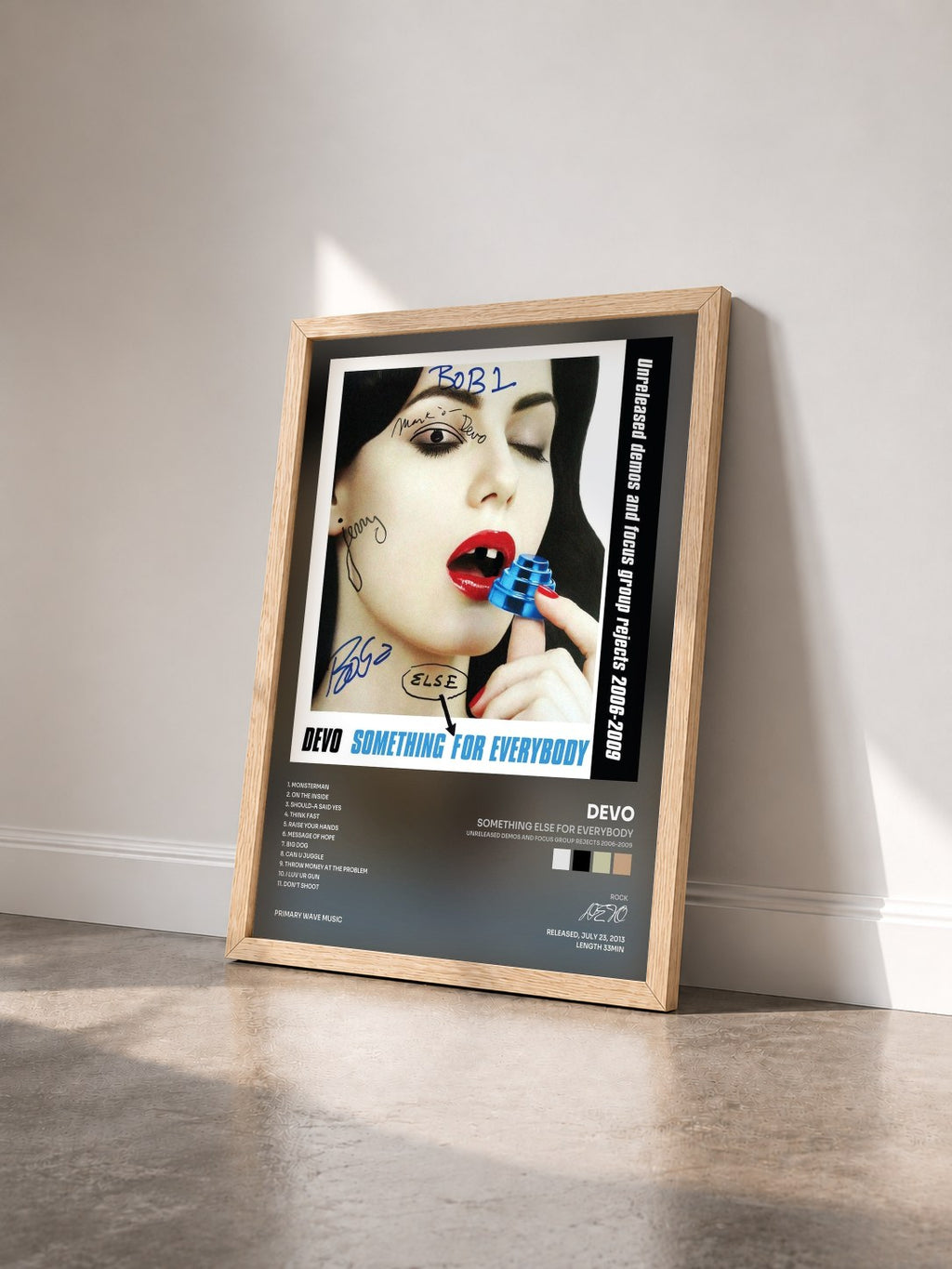 #bois Tableau de l'album Something Else For Everybody (Unreleased Demos and Focus Group Rejects 2006-2009) de DEVO vu de trois quarts, cadre en bois brut