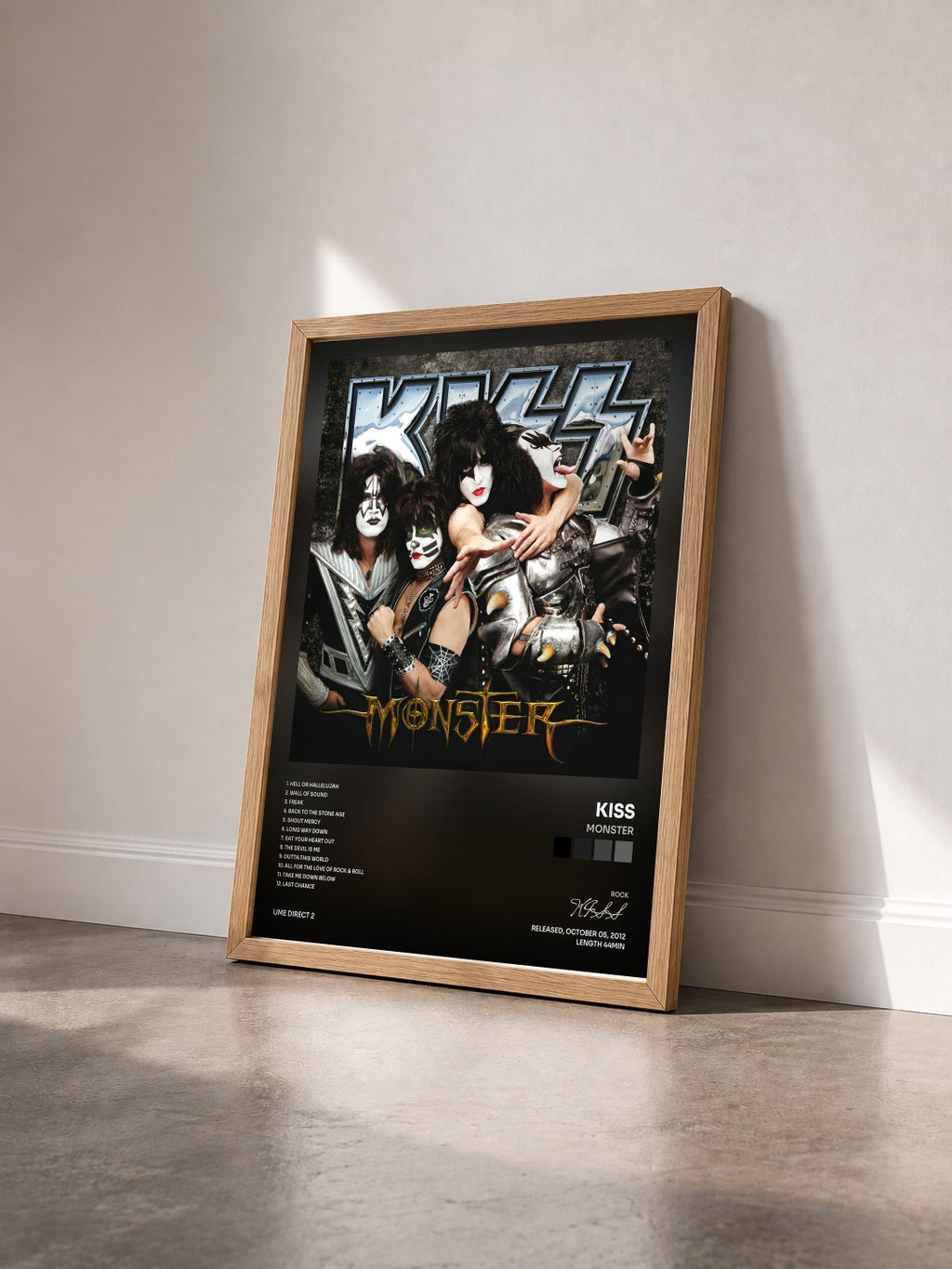 #bois Tableau de l'album Monster de KISS vu de trois quarts, cadre en bois brut