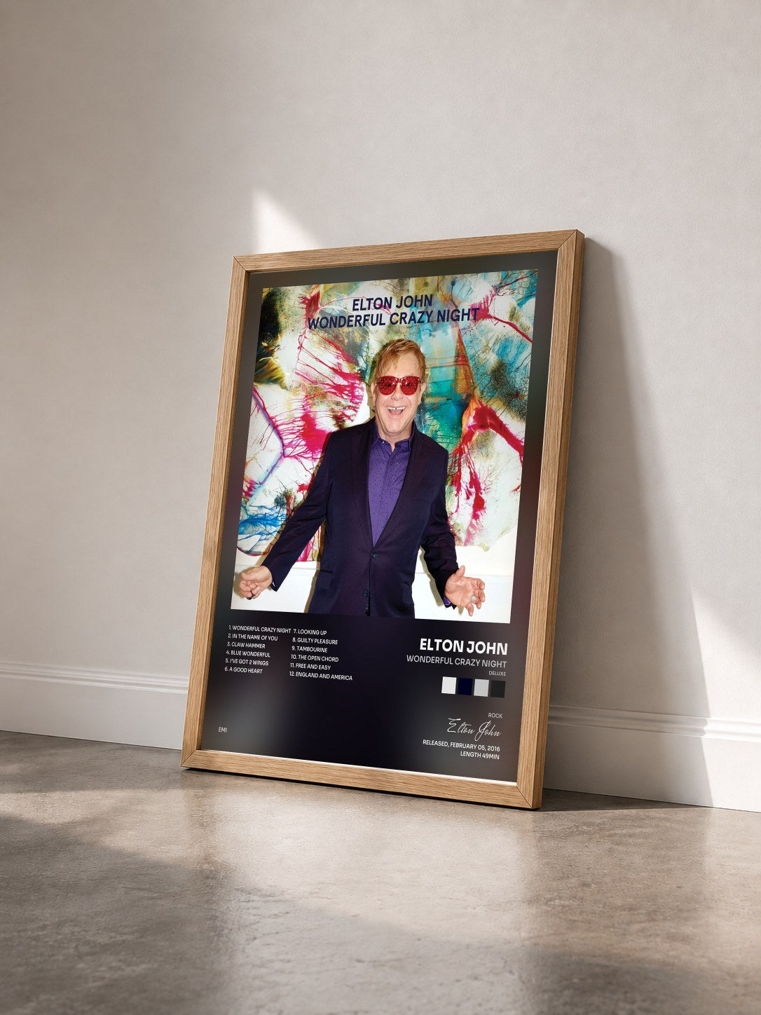 #bois Tableau de l'album Wonderful Crazy Night (Deluxe) de Elton John vu de trois quarts, cadre en bois brut