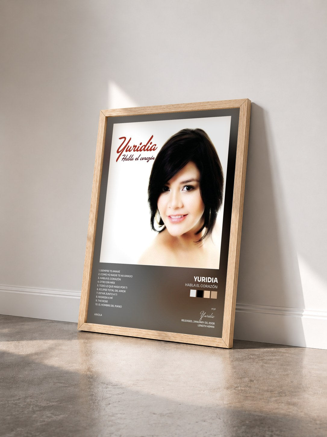 #bois Tableau de l'album Habla el Corazón de Yuridia vu de trois quarts, cadre en bois brut